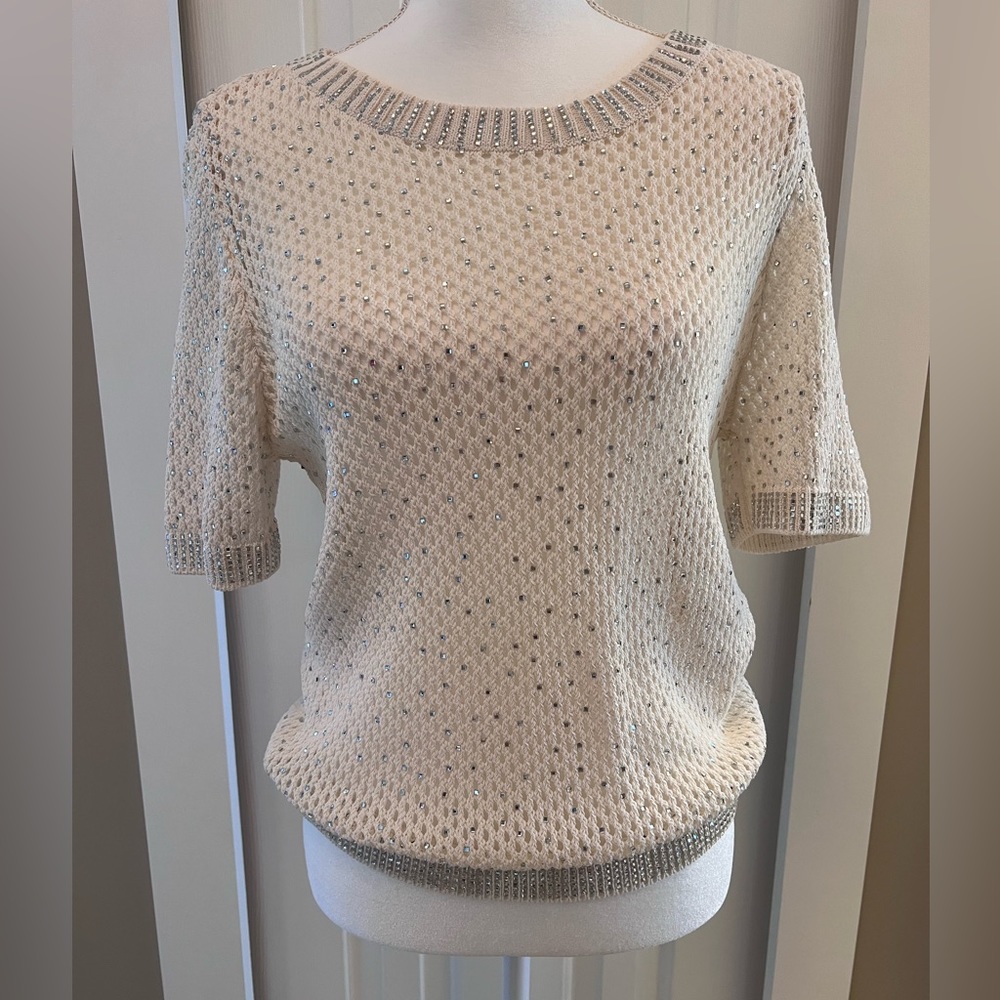 White House, Black market. Knit top with rhinestones.